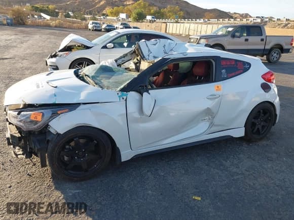 ✅ 2014 Hyundai Veloster Turbo • VIN: KMHTC6AE0EU200518 • Lot: 41198089. Wystawiony na IAAI z przebiegiem Nie podano. Bezpłatny archiwum sprzedaży aukcyjnych z USA i szczegółowy raport historii pojazdu na DreamBid. Zdjęcie 13.