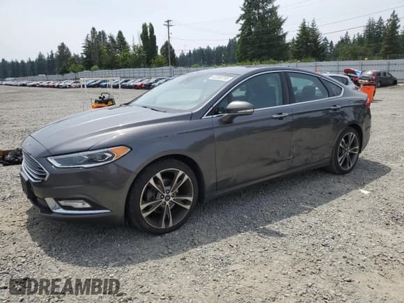 ✅ 2017 Ford Fusion Titanium • VIN: 3FA6P0K95HR139060 • Lot: 62200755. Listed on Copart with 106,133 mi. Free auction sales archive from the USA and detailed vehicle history report at DreamBid. Image 1.
