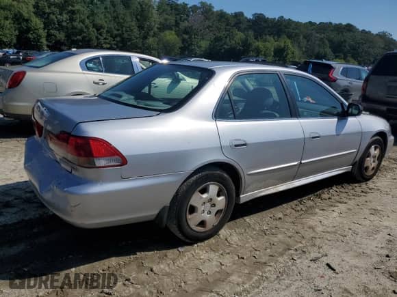 2002 Honda Accord EX с VIN 1HGCG16592A019825, выставлен на аукционе Copart как лот 81120885 с пробегом 172 452 миль миль и Списание • Salvage title. История ставок и продаж доступна на DreamBid. Изображение 3.