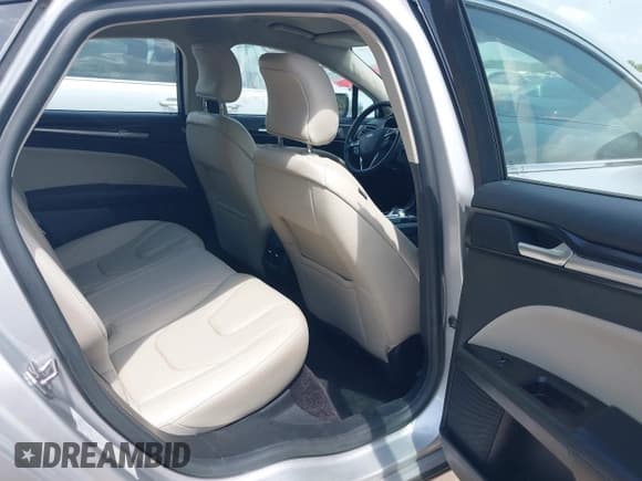 ✅ 2017 Ford Fusion Hybrid Titanium • VIN: 3FA6P0RU1HR317556 • Lot: 42549706. Listed on IAAI with 77,744 mi. Free auction sales archive from the USA and detailed vehicle history report at DreamBid. Image 8.