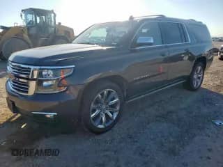 2015 Chevrolet Suburban LTZ z VIN 1GNSCKKC5FR303631, wystawiony jako Copart lot #82170305 z przebiegiem 234 598 mil mil oraz Szkoda całkowita • Salvage title. Historia ofert i sprzedaży dostępna na DreamBid. Obrazek 1.