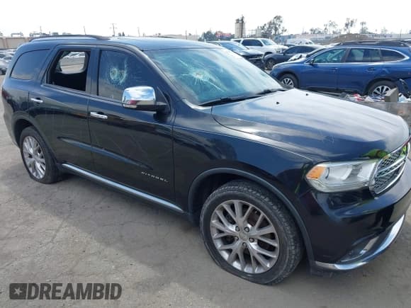 ✅ 2014 Dodge Durango Citadel • VIN: 1C4RDHEG7EC300852 • Lot: 42007888. Listed on IAAI with 128,662 mi. Free auction sales archive from the USA and detailed vehicle history report at DreamBid. Image 19.