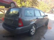 ✅ 2003 Ford Focus SE Fleet • VIN: 1FAFP36303W293074 • Lot: 43709410. Listed on IAAI with 260,595 mi. Free auction sales archive from the USA and detailed vehicle history report at DreamBid. Image 4.