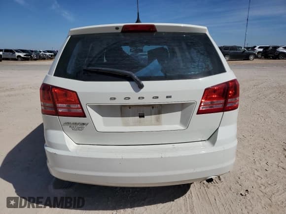 ✅ 2013 Dodge Journey SE • VIN: 3C4PDCAB5DT668504 • Lot: 82673085. Listed on Copart with 115,588 mi. Free auction sales archive from the USA and detailed vehicle history report at DreamBid. Image 6.