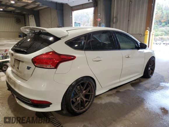 ✅ 2016 Ford Focus ST • VIN: 1FADP3L97GL295850 • Lot: 89453855. Listed on Copart with 60,034 mi. Free auction sales archive from the USA and detailed vehicle history report at DreamBid. Image 3.