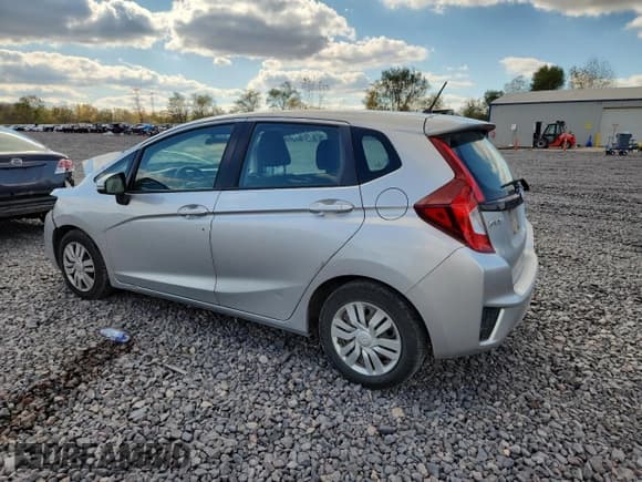 ✅ 2015 Honda Fit LX • VIN: 3HGGK5H51FM774934 • Лот: 90825115. Опубликован ранее на Copart с пробегом 161 315 миль. Бесплатный доступ к архиву аукционных продаж из США и подробный отчёт об истории автомобиля на DreamBid. Изображение 2.