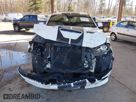 2018 Dodge Durango SRT with VIN 1C4SDJGJ3JC395759, listed as a IAAI auction lot 41689356 with 83,577 mi miles and . Bid and sale history available at DreamBid. Image 13.