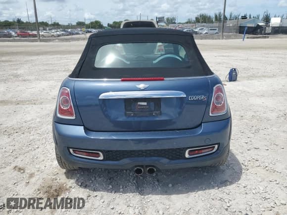 ✅ 2011 MINI Convertible S • VIN: WMWZP3C50BTX83220 • Lot: 61590205. Listed on Copart with 80,979 mi. Free auction sales archive from the USA and detailed vehicle history report at DreamBid. Image 6.