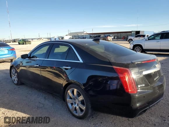 ✅ 2015 Cadillac CTS Premium RWD • VIN: 1G6AT5S38F0125744 • Лот: 81652983. Опубликован ранее на Copart с пробегом 98 217 миль. Бесплатный доступ к архиву аукционных продаж из США и подробный отчёт об истории автомобиля на DreamBid. Изображение 2.