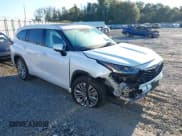 ✅ 2023 Toyota Highlander Hybrid Platinum • VIN: 5TDFARAH0PS022104 • Lot: 43481334. Listed on IAAI with 20,941 mi. Free auction sales archive from the USA and detailed vehicle history report at DreamBid. Image 1.