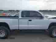 2002 Dodge Dakota Sport z VIN 1B7GL32X22S508401, wystawiony jako IAAI lot #41591465 z przebiegiem Nie podano mil oraz . Historia ofert i sprzedaży dostępna na DreamBid. Obrazek 13.