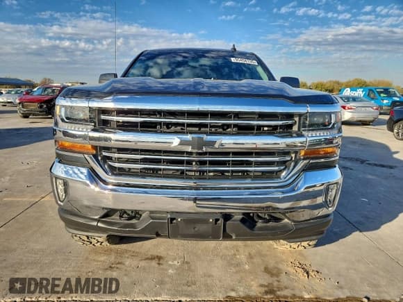 ✅ 2018 Chevrolet Silverado 1500 LT • VIN: 3GCUKREC8JG569436 • Лот: 95458135. Опубликован ранее на Copart с пробегом 97 058 миль. Бесплатный доступ к архиву аукционных продаж из США и подробный отчёт об истории автомобиля на DreamBid. Изображение 5.