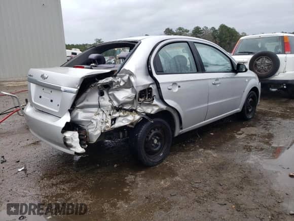 2007 Chevrolet Aveo LS z VIN KL1TD56647B124787, wystawiony jako Copart lot #44301344 z przebiegiem Nie podano mil oraz Szkoda całkowita • Salvage title. Historia ofert i sprzedaży dostępna na DreamBid. Obrazek 3.