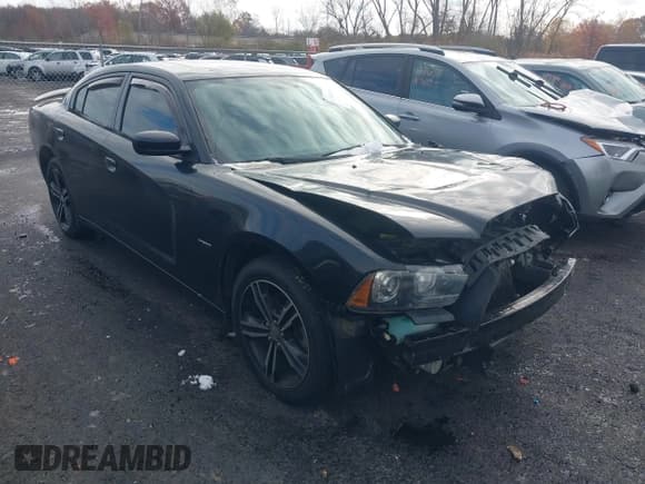 ✅ 2014 Dodge Charger RT Max • VIN: 2C3CDXDT0EH281304 • Lot: 43651055. Listed on IAAI with 147,287 mi. Free auction sales archive from the USA and detailed vehicle history report at DreamBid. Image 1.