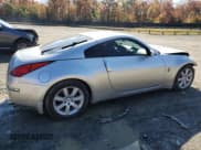 ✅ 2003 Nissan 350Z Touring • VIN: JN1AZ34D13T104186 • Лот: 91403345. Опубликован ранее на Copart с пробегом 51 403 миль. Бесплатный доступ к архиву аукционных продаж из США и подробный отчёт об истории автомобиля на DreamBid. Изображение 3.