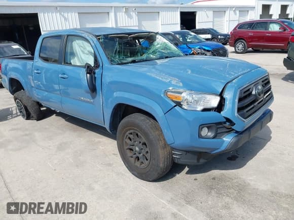 ✅ 2019 Toyota Tacoma SR5 • VIN: 3TMBZ5DN1KM018282 • Lot: 41990216. Listed on IAAI with 88,764 mi. Free auction sales archive from the USA and detailed vehicle history report at DreamBid. Image 1.