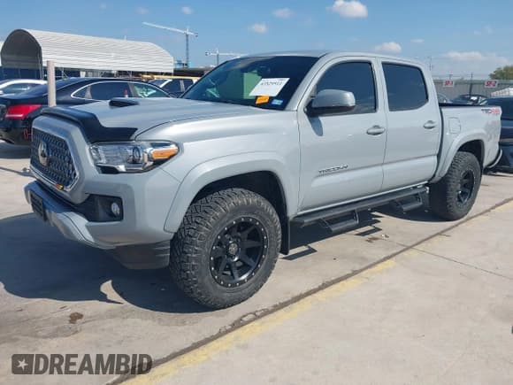 ✅ 2019 Toyota Tacoma SR5 • VIN: 3TMCZ5ANXKM221566 • Лот: 43529511. Опубликован ранее на IAAI с пробегом 50 529 миль. Бесплатный доступ к архиву аукционных продаж из США и подробный отчёт об истории автомобиля на DreamBid. Изображение 18.