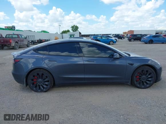 ✅ 2022 Tesla Model 3 Performance • VIN: 5YJ3E1EC9NF355670 • Лот: 42598721. Опубликован ранее на IAAI с пробегом 78 140 миль. Бесплатный доступ к архиву аукционных продаж из США и подробный отчёт об истории автомобиля на DreamBid. Изображение 13.