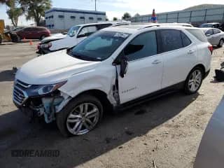 2018 Chevrolet Equinox Premier z VIN 2GNAXMEV4J6187139, wystawiony jako Copart lot #64096875 z przebiegiem 138 300 mil mil oraz Szkoda całkowita • Salvage title. Historia ofert i sprzedaży dostępna na DreamBid. Obrazek 1.