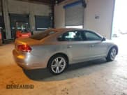 ✅ 2014 Volkswagen Passat SEL Premium • VIN: 1VWCM7A31EC076235 • Лот: 87129125. Опубликован ранее на Copart с пробегом 116 480 миль. Бесплатный доступ к архиву аукционных продаж из США и подробный отчёт об истории автомобиля на DreamBid. Изображение 3.