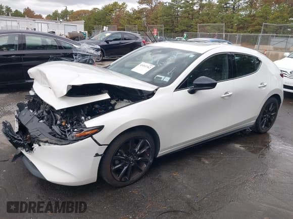 ✅ 2022 Mazda 3 2.5 Turbo • VIN: JM1BPBJY8N1509162 • Lot: 43492762. Listed on IAAI with 33,085 mi. Free auction sales archive from the USA and detailed vehicle history report at DreamBid. Image 2.