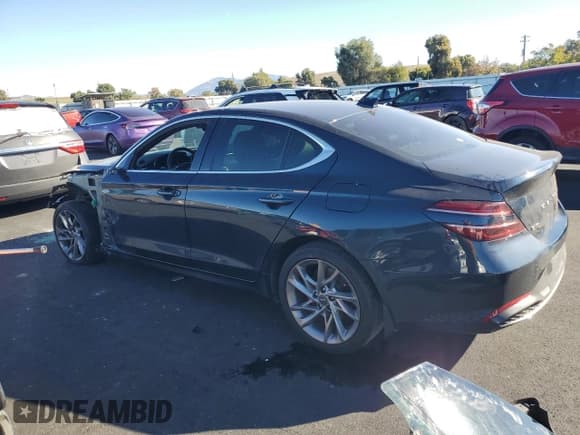 ✅ 2022 Genesis G70 2.0T • VIN: KMTG34TA0NU102983 • Lot: 82777365. Wystawiony na Copart z przebiegiem 105 225 mil. Bezpłatny archiwum sprzedaży aukcyjnych z USA i szczegółowy raport historii pojazdu na DreamBid. Zdjęcie 2.