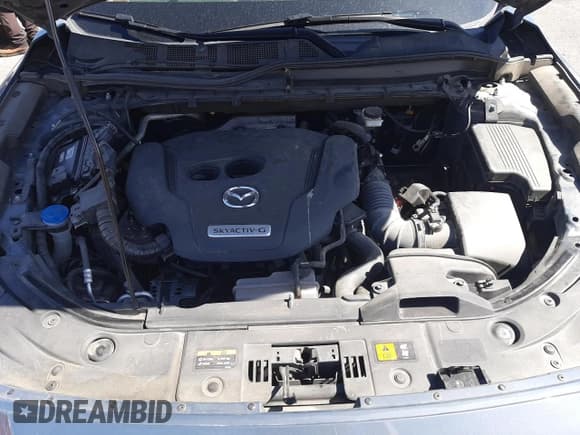 ✅ 2021 Mazda CX-5 Carbon Edition • VIN: JM3KFACY8M0348477 • Lot: 58185755. Wystawiony na Copart z przebiegiem 85 864 mil. Bezpłatny archiwum sprzedaży aukcyjnych z USA i szczegółowy raport historii pojazdu na DreamBid. Zdjęcie 11.