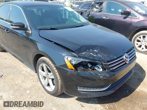 ✅ 2014 Volkswagen Passat SE • VIN: 1VWBT7A3XEC106248 • Лот: 43014144. Опубликован ранее на IAAI с пробегом 124 035 миль. Бесплатный доступ к архиву аукционных продаж из США и подробный отчёт об истории автомобиля на DreamBid. Изображение 6.
