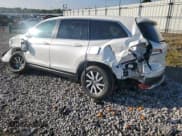 ✅ 2022 Honda Pilot EX-L • VIN: 5FNYF6H55NB000346 • Lot: 83874615. Listed on Copart with 49,962 mi. Free auction sales archive from the USA and detailed vehicle history report at DreamBid. Image 2.