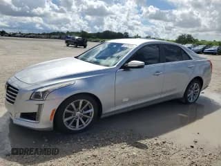 ✅ 2018 Cadillac CTS RWD • VIN: 1G6AP5SX0J0179605 • Lot: 81726105. Listed on Copart with 105,202 mi. Free auction sales archive from the USA and detailed vehicle history report at DreamBid. Image 1.