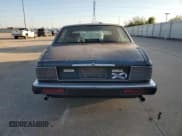 ✅ 1992 Jaguar XJ • VIN: SAJKY1744NC666849 • Lot: 77355244. Listed on Copart with Not provided. Free auction sales archive from the USA and detailed vehicle history report at DreamBid. Image 6.