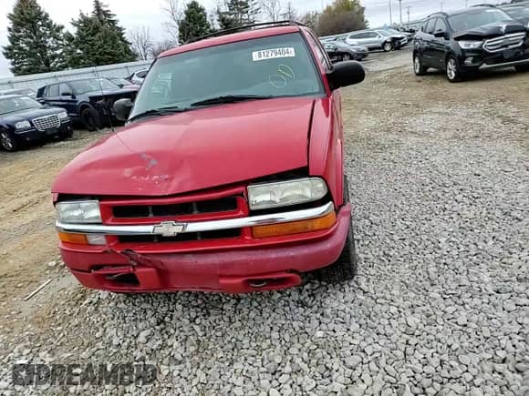 2002 Chevrolet Blazer LS z VIN 1GNDT13WX2K174090, wystawiony jako Copart lot #81279404 z przebiegiem 168 373 mil mil oraz Szkoda całkowita • Salvage title. Historia ofert i sprzedaży dostępna na DreamBid. Obrazek 12.
