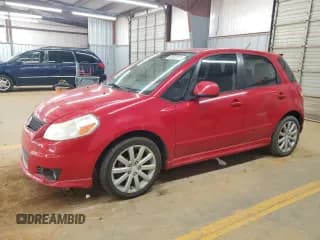 ✅ 2012 Suzuki SX4 Sportback • VIN: JS2YA5A54C6300655 • Лот: 60602075. Опубликован ранее на Copart с пробегом 162 832 миль. Бесплатный доступ к архиву аукционных продаж из США и подробный отчёт об истории автомобиля на DreamBid. Изображение 1.