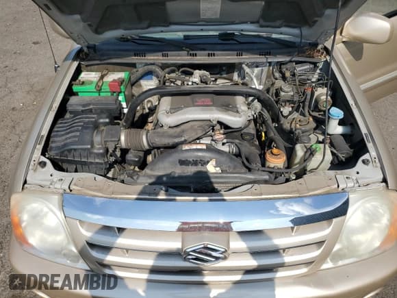 ✅ 2006 Suzuki XL7 • VIN: JS3TX92V964107587 • Лот: 70628965. Опубликован ранее на Copart с пробегом 139 279 миль. Бесплатный доступ к архиву аукционных продаж из США и подробный отчёт об истории автомобиля на DreamBid. Изображение 12.