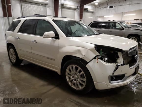 ✅ 2015 GMC Acadia Denali • VIN: 1GKKVTKD4FJ320747 • Lot: 82299865. Listed on Copart with 127,690 mi. Free auction sales archive from the USA and detailed vehicle history report at DreamBid. Image 4.