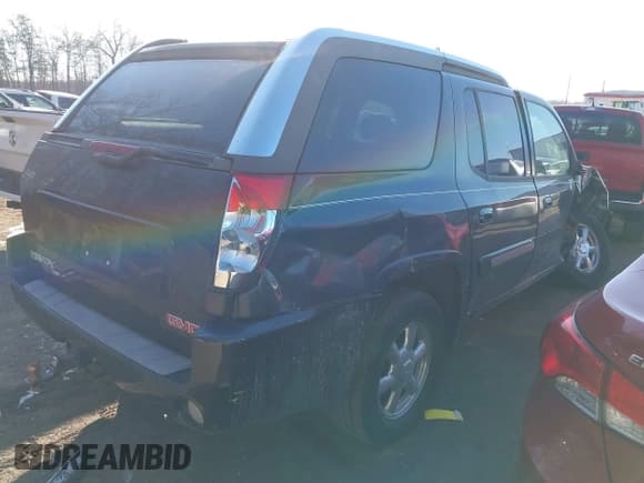 ✅ 2004 GMC Envoy SLE • VIN: 1GKES12S246191321 • Lot: 41386219. Listed on IAAI with 116,019 mi. Free auction sales archive from the USA and detailed vehicle history report at DreamBid. Image 4.