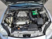 ✅ 2002 Chrysler Sebring LXi • VIN: 4C3AG52H92E080522 • Lot: 57035675. Wystawiony na Copart z przebiegiem 72 256 mil. Bezpłatny archiwum sprzedaży aukcyjnych z USA i szczegółowy raport historii pojazdu na DreamBid. Zdjęcie 11.