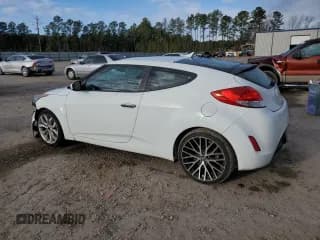 ✅ 2014 Hyundai Veloster • VIN: KMHTC6ADXEU214255 • Lot: 86828824. Listed on Copart with 144,731 mi. Free auction sales archive from the USA and detailed vehicle history report at DreamBid. Image 2.