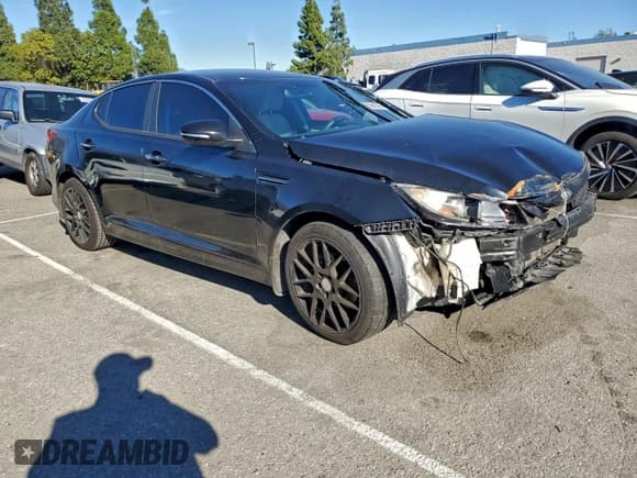 ✅ 2014 Kia Optima LX • VIN: 5XXGM4A75EG329580 • Lot: 95564365. Listed on Copart with 128,899 mi. Free auction sales archive from the USA and detailed vehicle history report at DreamBid. Image 4.