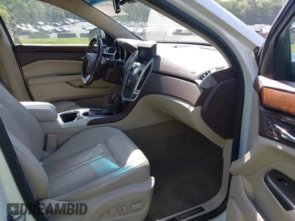 ✅ 2012 Cadillac SRX Performance Collection • VIN: 3GYFNBE30CS599466 • Lot: 42053911. Listed on IAAI with 167,242 mi. Free auction sales archive from the USA and detailed vehicle history report at DreamBid. Image 5.