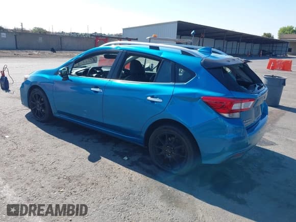 ✅ 2018 Subaru Impreza Limited • VIN: 4S3GTAT64J3738699 • Lot: 42723506. Listed on IAAI with 183,088 mi. Free auction sales archive from the USA and detailed vehicle history report at DreamBid. Image 3.