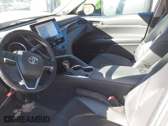 2022 Toyota Camry Hybrid XLE with VIN 4T1F31AK4NU599424, listed as a IAAI auction lot 40839336 with 68,918 mi miles and . Bid and sale history available at DreamBid. Image 5.