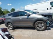 ✅ 2018 Hyundai Santa Fe 2.4L • VIN: 5NMZTDLB4JH107766 • Лот: 43043034. Опубликован ранее на IAAI с пробегом 93 208 миль. Бесплатный доступ к архиву аукционных продаж из США и подробный отчёт об истории автомобиля на DreamBid. Изображение 14.