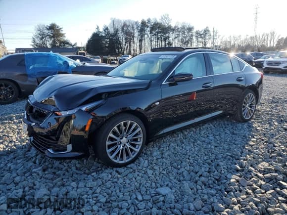 ✅ 2022 Cadillac CT5 Premium Luxury • VIN: 1G6DT5RK4N0136202 • Лот: 56398305. Опубликован ранее на Copart с пробегом 20 300 миль. Бесплатный доступ к архиву аукционных продаж из США и подробный отчёт об истории автомобиля на DreamBid. Изображение 1.
