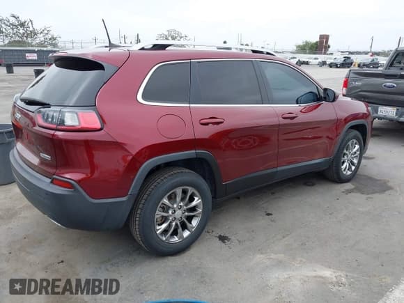 ✅ 2021 Jeep Cherokee 80th Anniversary • VIN: 1C4PJMMX1MD200569 • Lot: 42975007. Listed on IAAI with 79,573 mi. Free auction sales archive from the USA and detailed vehicle history report at DreamBid. Image 4.