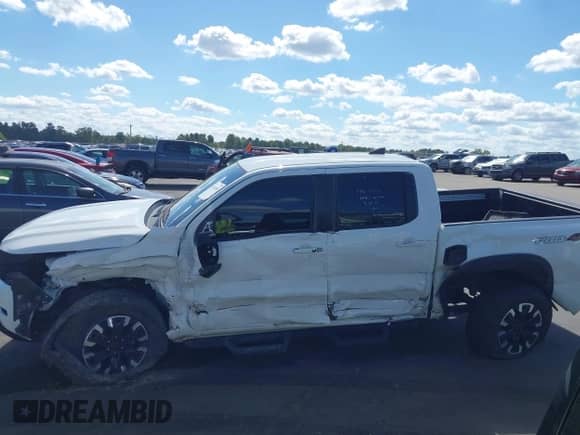 ✅ 2023 Nissan Frontier SV • VIN: 1N6ED1EKXPN630337 • Lot: 43387005. Listed on IAAI with 41,703 mi. Free auction sales archive from the USA and detailed vehicle history report at DreamBid. Image 14.