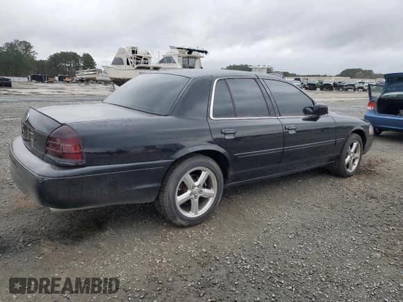 ✅ 2003 Mercury Marauder • VIN: 2MEHM75V03X633896 • Лот: 47188565. Опубликован ранее на Copart с пробегом 154 154 миль. Бесплатный доступ к архиву аукционных продаж из США и подробный отчёт об истории автомобиля на DreamBid. Изображение 3.