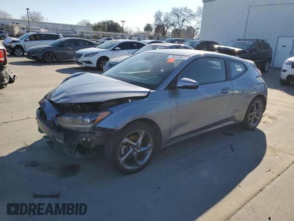 2019 Hyundai Veloster Premium z VIN KMHTG6AF4KU018376, wystawiony jako Copart lot #42489705 z przebiegiem 87 399 mil mil oraz Czysty tytuł • Clean title. Historia ofert i sprzedaży dostępna na DreamBid. Obrazek 1.