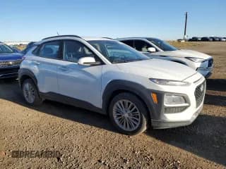 ✅ 2018 Hyundai Kona SEL • VIN: KM8K22AA0JU088656 • Лот: 77535684. Опубликован ранее на Copart с пробегом 100 988 миль. Бесплатный доступ к архиву аукционных продаж из США и подробный отчёт об истории автомобиля на DreamBid. Изображение 4.