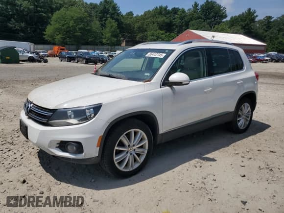 ✅ 2013 Volkswagen Tiguan SE • VIN: WVGBV7AX7DW519222 • Lot: 66412745. Listed on Copart with 212,404 mi. Free auction sales archive from the USA and detailed vehicle history report at DreamBid. Image 1.